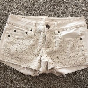 American Eagle cream colored denim shorts